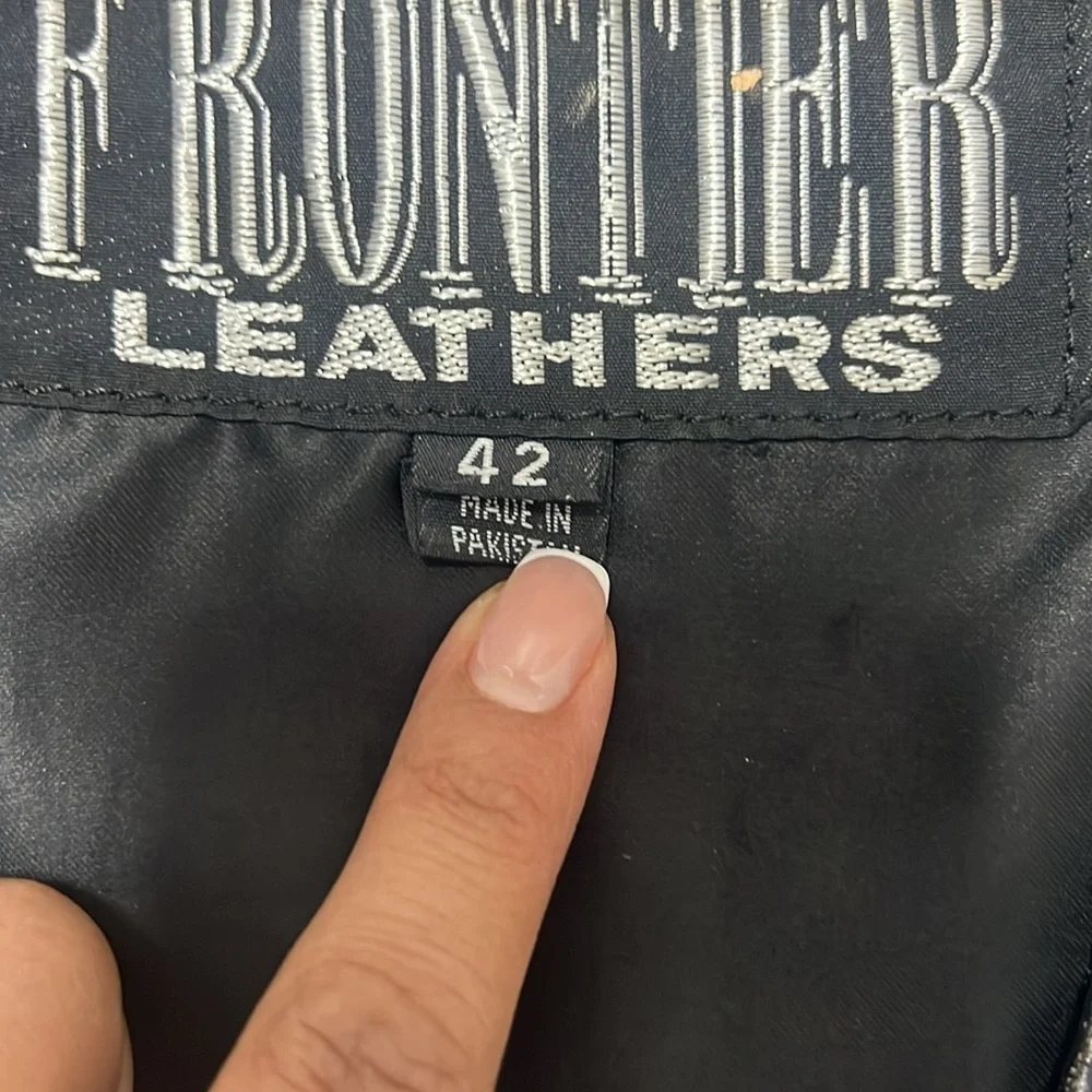 Frontier Leather Men’s Vest w/ the “Harley Davidson” patch on the back. Size 42